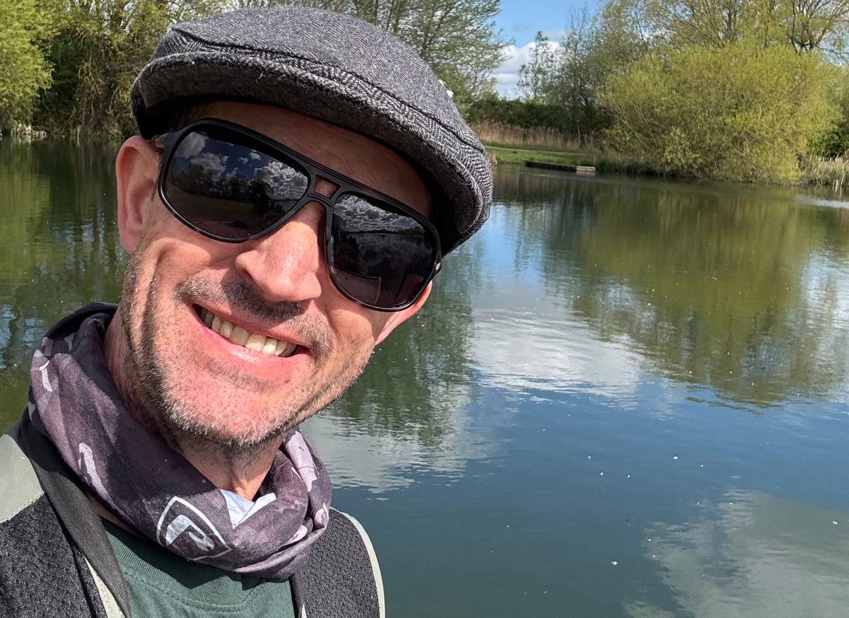 Cap and glasses fly fishing